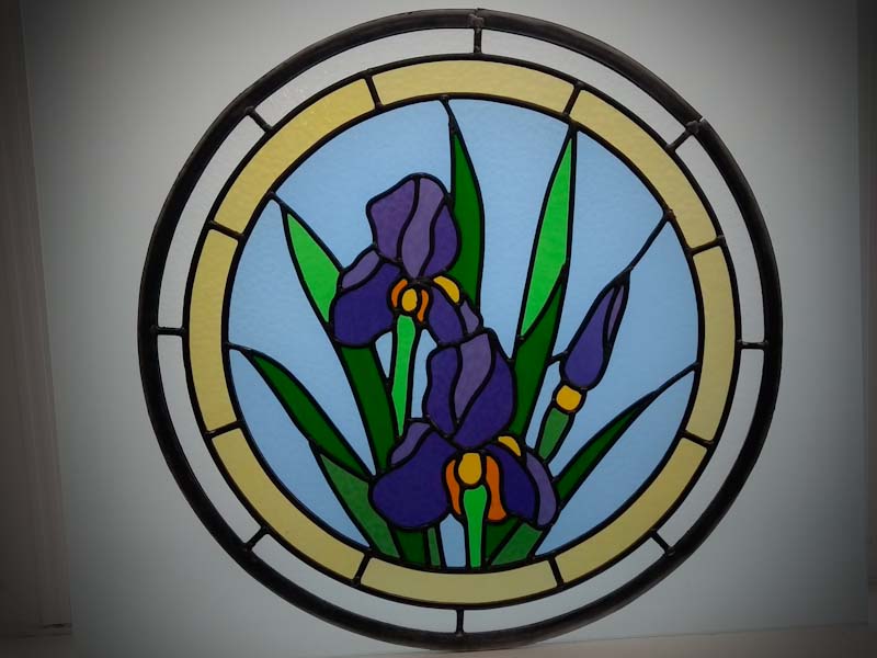 Round, 'porthole' stained glass window,  near Somerton, made in Somerset